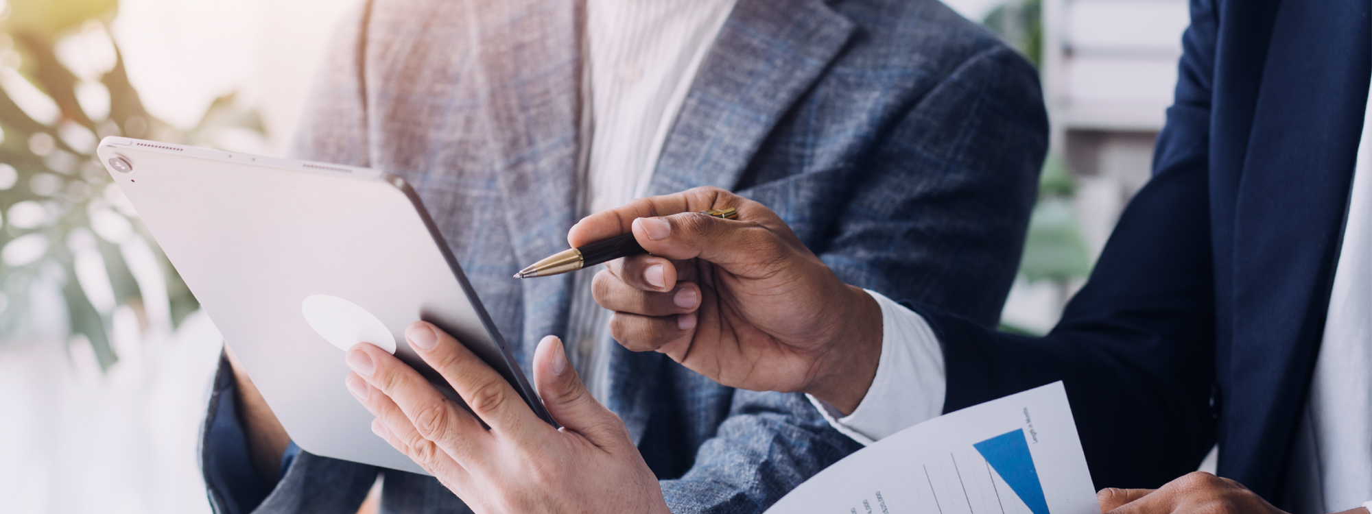 Advisor reviewing client information on a tablet
